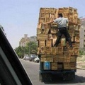 Funny-Dangerous-Hanging-Man-Behind-Truck